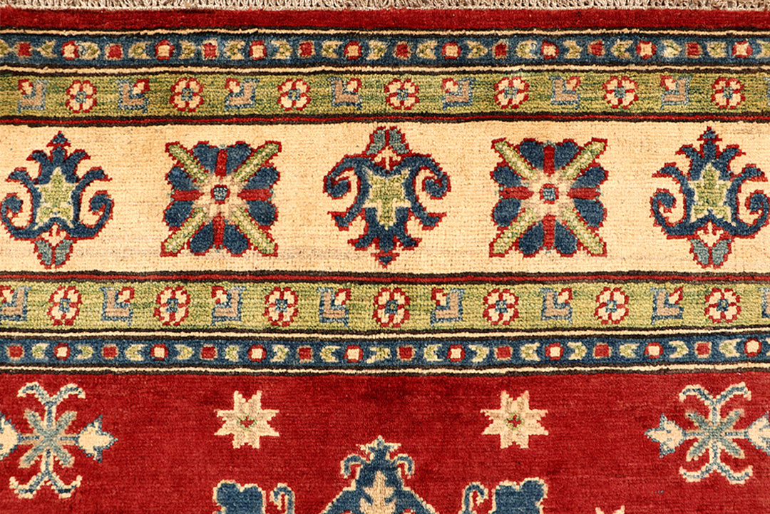 Firebrick Kazak 6' 7 x 9' 5 - No. 68235 - ALRUG Rug Store