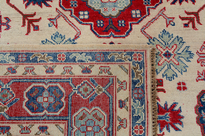 White Afghan Kazak Rug 4'11" x 6'6" Hand-Knotted texture