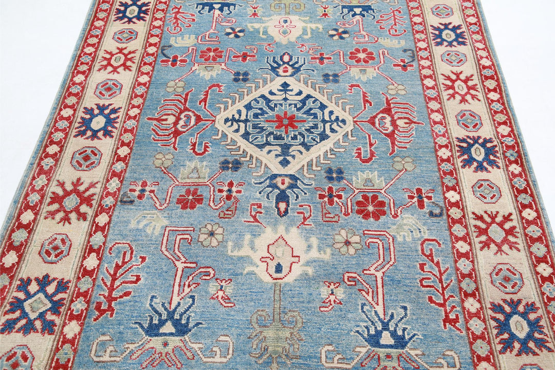 Kazak 4’ 10” x 6’ 7″ - No. AV56726 - ALRUG Rug Store